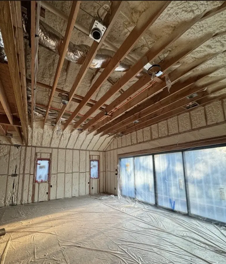 Interior walls and ceiling insulated with spray foam during new construction in Lone Tree